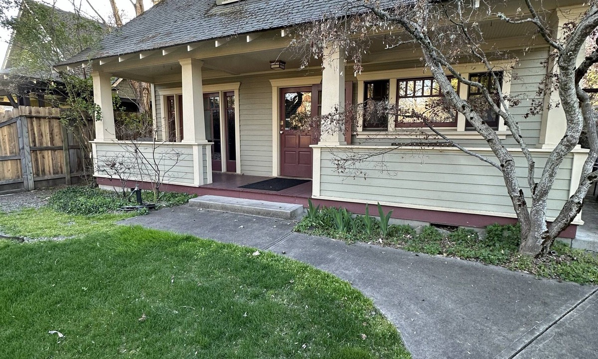 Jacksonville Cottage | Charming Jacksonville cottage with a front porch, full kitchen, off-street parking, and walkable access to Britt Festival, downtown shops, restaurants, and wine tasting. Features two bedrooms, two bathrooms, and peaceful historic charm.