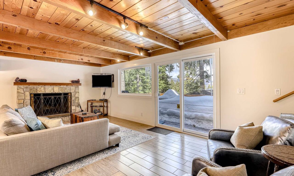 Chamberlands House | Classic Tahoe cabin charm with partial lake views, Chamberlands amenities, and year-round adventure just minutes away.