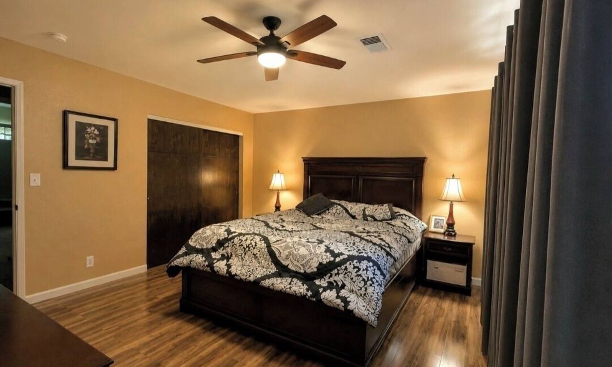 Redding House | Hillside home with large deck in a woodsy area. Sleeps 8