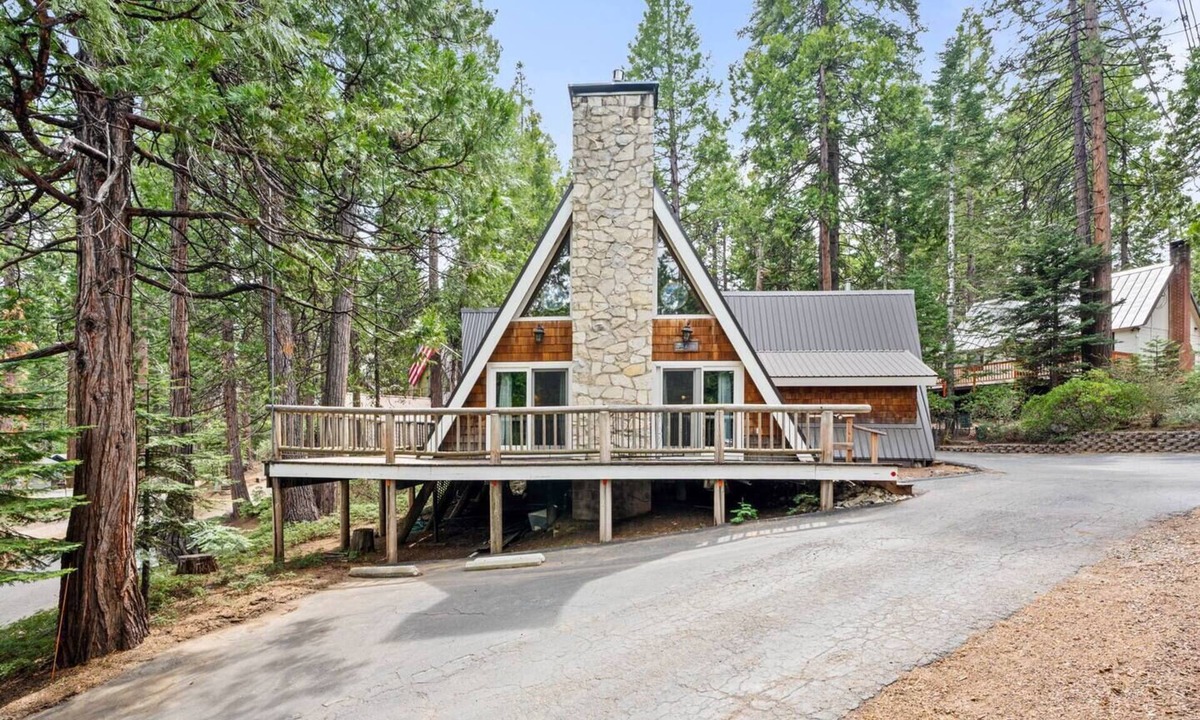 Shaver Lake Cabin | This one-of-a-kind A-frame cabin is full of mountain charm! Short walk to all of the shops, restaurants, and the lake!