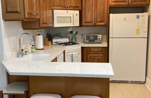 Hermosa Beach House | 2 Bedroom Strand Townhome with A/C, Rooftop Deck and Parking. Walk to Beach Life
