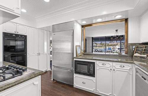 Balboa Island House | Charming 5BR Mid-Century Bayfront Retreat with Floor-to-Ceiling Windows!