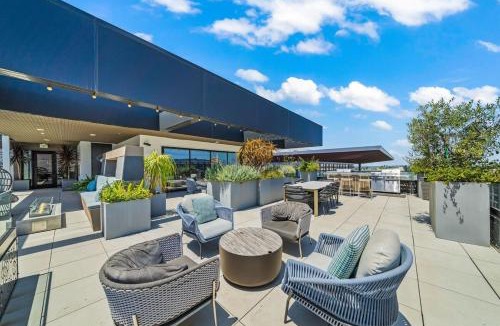 West Gateway Apartment | Chic Downtown Stay Walk to Beach