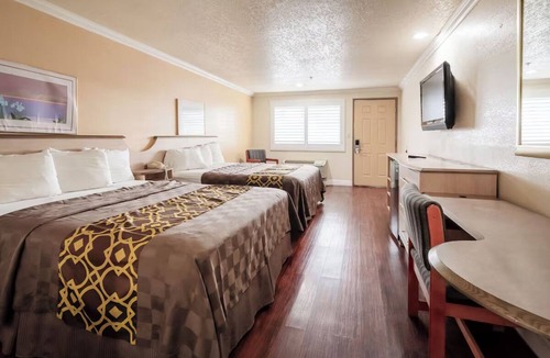 Corcoran Hotel | Essential Comforts in a Clean Room Near Transit & Local Dining Hotspots