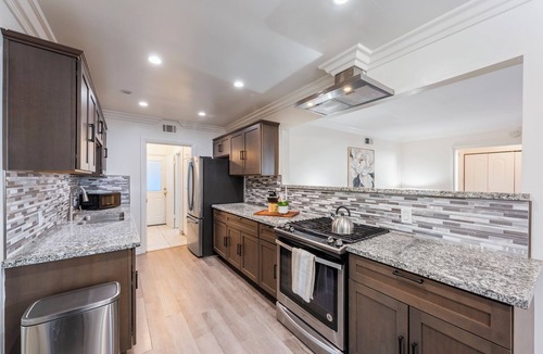 Pacoima House | Fenced 4BR - Pets OK, Park4Cars, W/D, Office Desk!