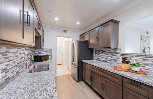 Pacoima House | Fenced 4BR - Pets OK, Park4Cars, W/D, Office Desk!