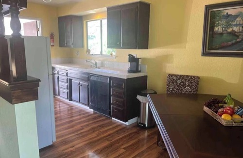 Redding House | Hillside home with large deck in a woodsy area. Sleeps 8