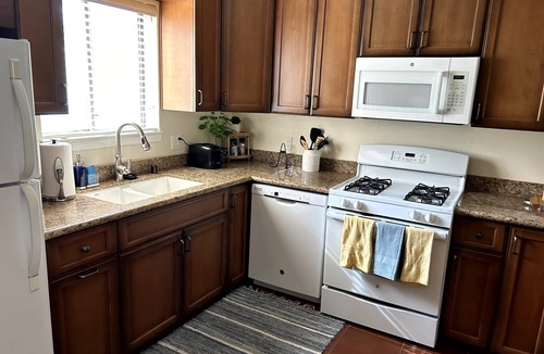 Palm Desert Condo | Lake view, steps to the pool, resort in Palm Desert.