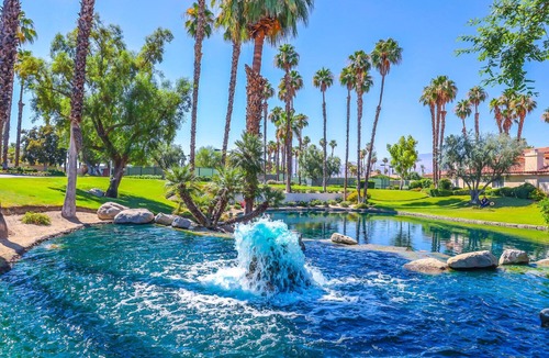 Palm Desert Condo | Lake view, steps to the pool, resort in Palm Desert.