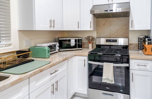 Riverview West House | Luxe Disneyland Multi-Family Villa King Beds Game Rooms EV Sleeps 28