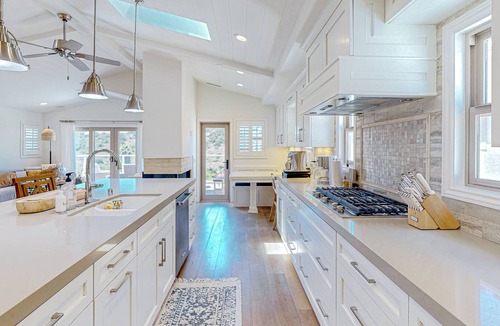 Monarch Beach House | Luxe home on golf course near beach access with hot tub, ocean views, fireplace