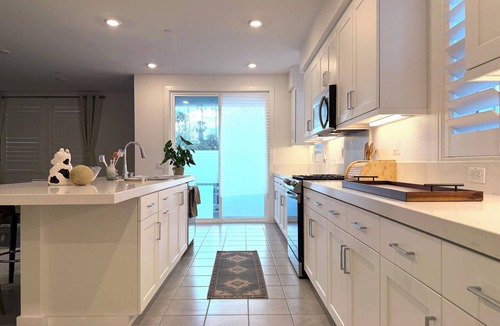 Northwest Anaheim House | Massive Townhome with Huge Home Theater and Gym