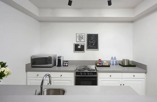 Norma Triangle Hotel | Modern 2 Units w/City Views, Rooftop Pool & Pet-Friendly Escape