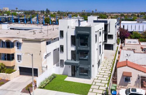 Mid City Villa | Modern 5 Bedroom Masterpiece With Rooftop Deck