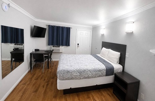 Mid City Hotel | Seaway Motel