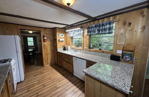 Candler Cottage | "Stoney Fork Creekside Cottage: Relax by the Creek with Hot Tub Bliss"
