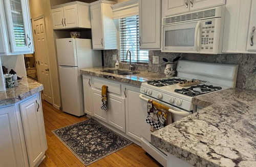 Desert Aire House | Tiny Home in premier 55+ Resort with pool, golf, hiking & cycling
