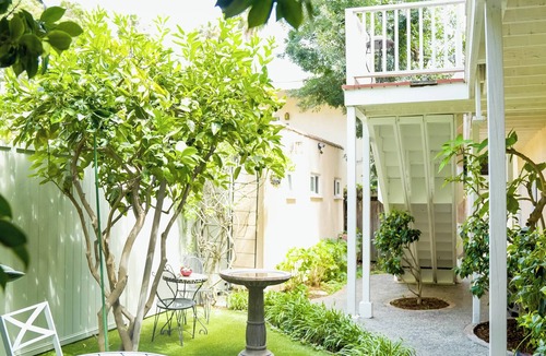 North of Wilshire Apartment | Walk to everything on Montana from this Garden retreat! - C