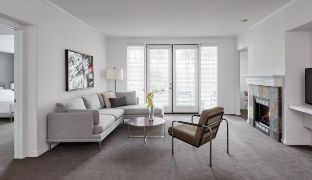 AKA Residences Sharply Appointed Suite w/Kitchen, Den Space, Patio, & WiFi