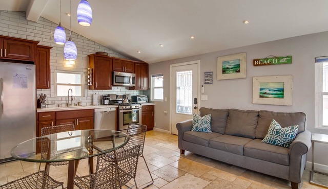Beachy 1BD Cottage 20 Steps to Sand with Parking & W/D! Stay 30 Days!