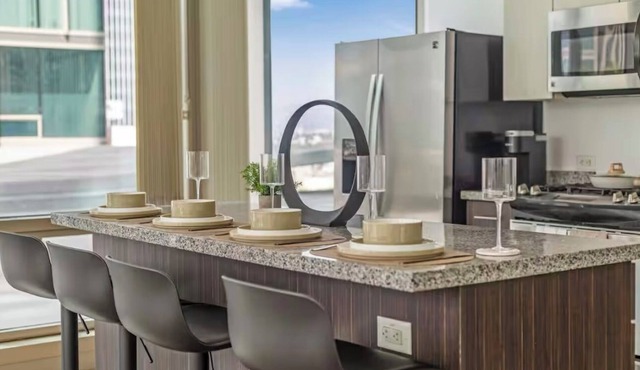 Beautiful luxury high-rise condo with views of downtown Los Angeles in Koreatown