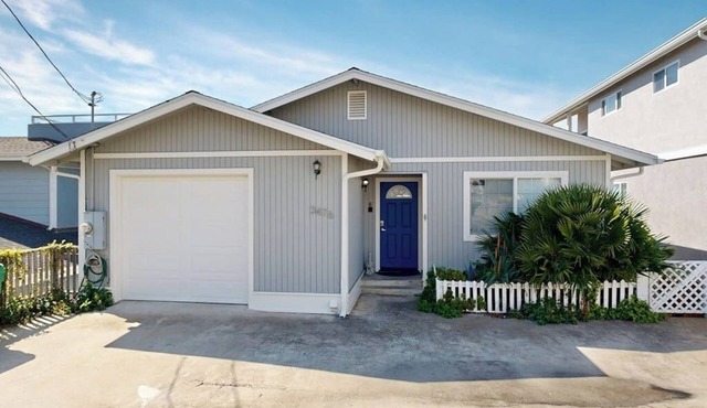 Charming, two-story home with deck, grill, and ocean views