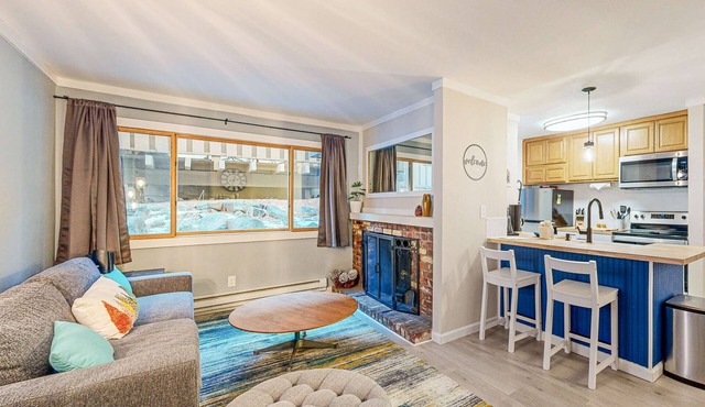 Condo with private beach, pool access, fireplace, WiFi, and nearby amenities