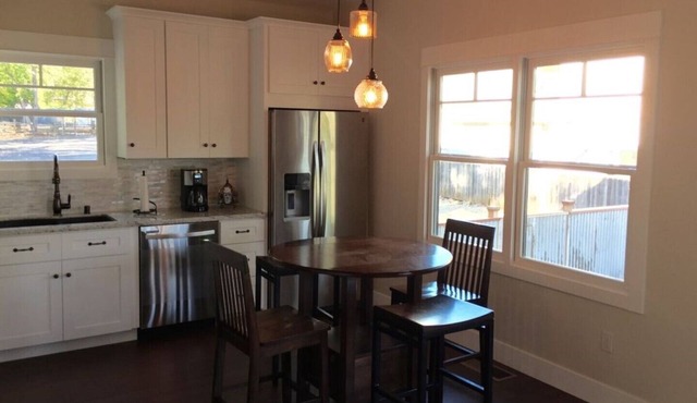 Downtown Location, Uptown Elegance! Re-Modeled “Murphys Original School House"
