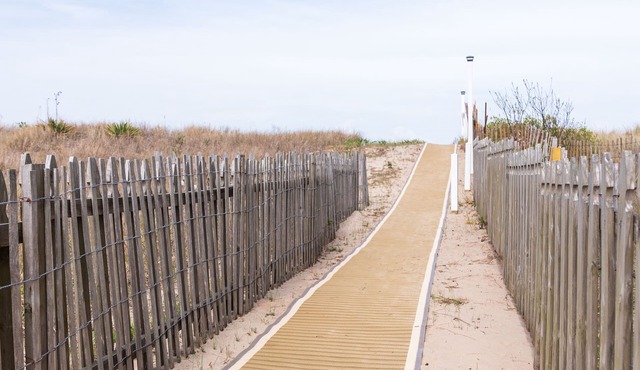 EXCLUSIVELY YOURS! Private Beach Path, Double Water Access, and Dog Friendly.