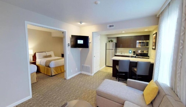 Family-Friendly 1BR Suite w/Kitchen + Living Area Near Newpark Mall + Breakfast