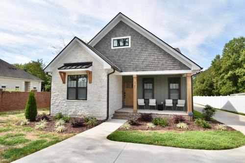 Luxury New Construction Cottage with fireplace, office, and covered deck