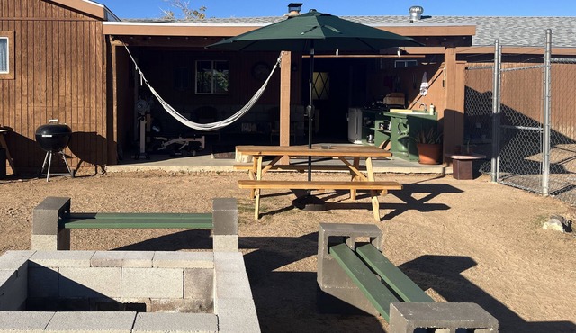 One bedroom semi-detached guest room in Yucca Valley home with outdoor kitchen