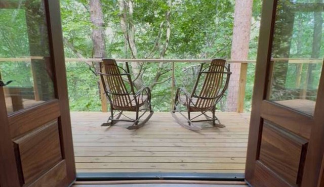 Riverfront A-frame cabin in the woods - minutes from downtown Greenville