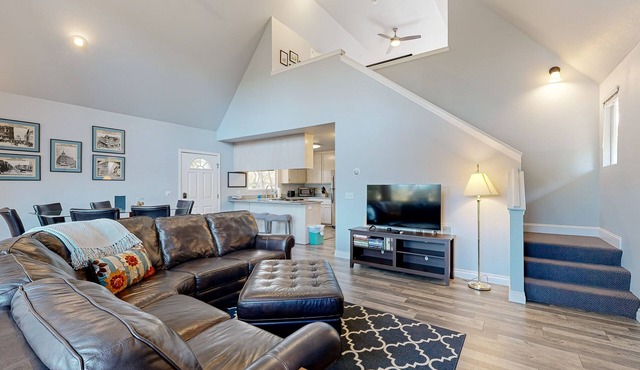 Serene home with spacious deck, fireplace, loft, nearby amenities, dog friendly
