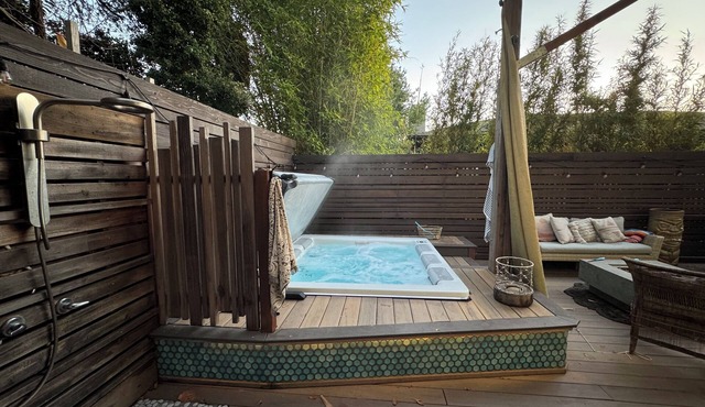 Sunny boho retreat with deck & stylish hot tub
